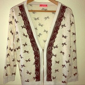 Cardigan with bow designs